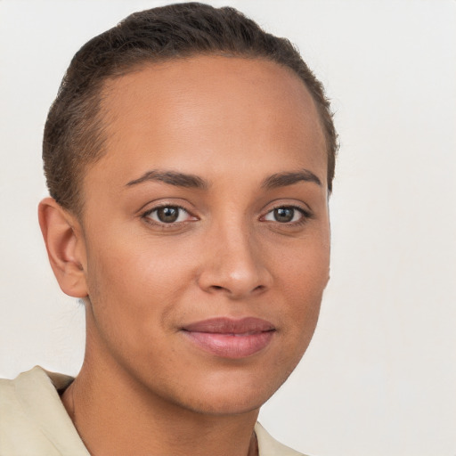 Joyful white young-adult female with short  brown hair and brown eyes