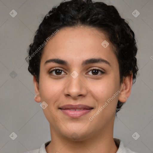 Joyful latino young-adult female with short  brown hair and brown eyes