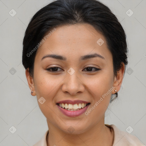 Joyful asian young-adult female with medium  brown hair and brown eyes