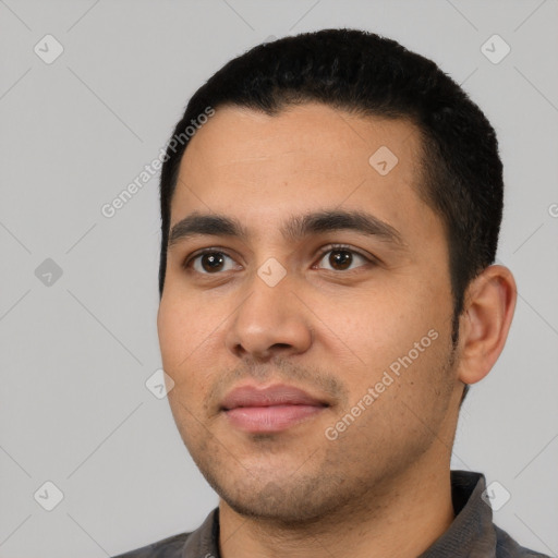 Neutral latino young-adult male with short  black hair and brown eyes