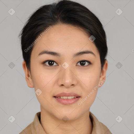 Joyful asian young-adult female with short  brown hair and brown eyes