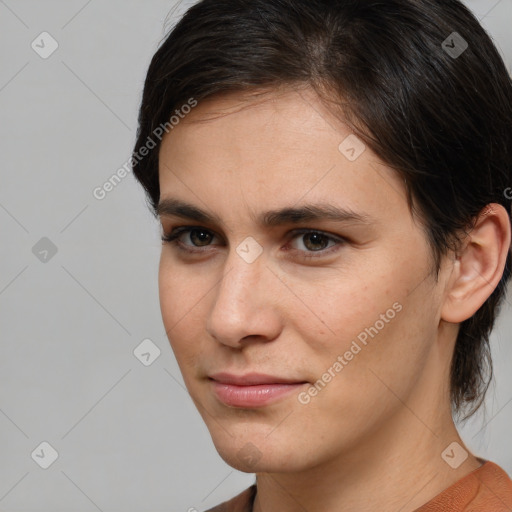 Neutral white young-adult female with medium  brown hair and brown eyes