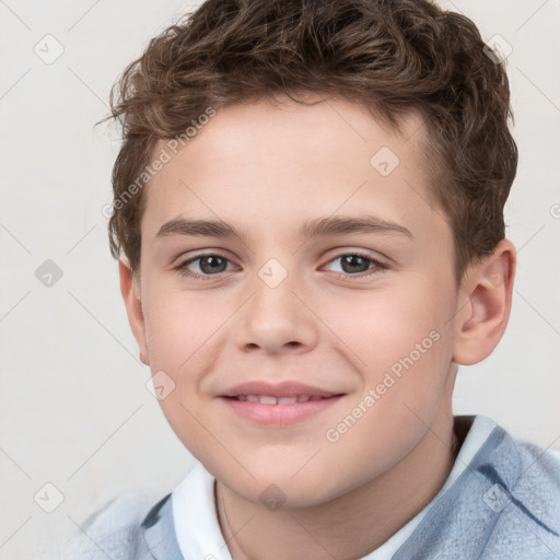 Joyful white child male with short  brown hair and brown eyes