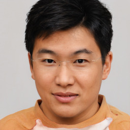 Neutral asian young-adult male with short  brown hair and brown eyes