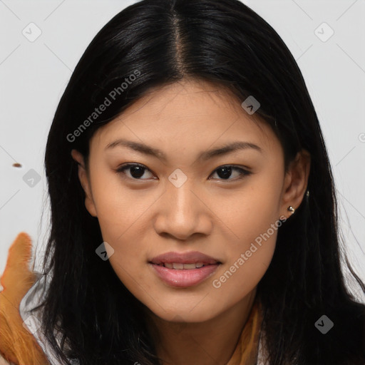 Joyful asian young-adult female with long  brown hair and brown eyes