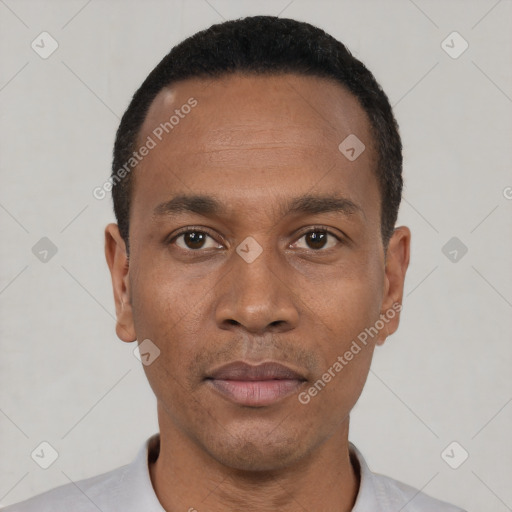 Neutral black young-adult male with short  black hair and brown eyes