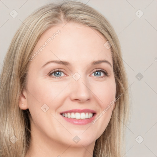 Joyful white young-adult female with long  brown hair and blue eyes