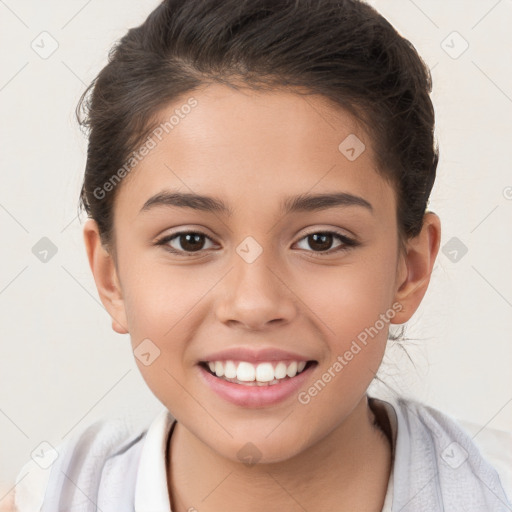 Joyful white child female with short  brown hair and brown eyes