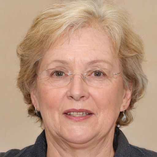 Joyful white middle-aged female with medium  brown hair and brown eyes