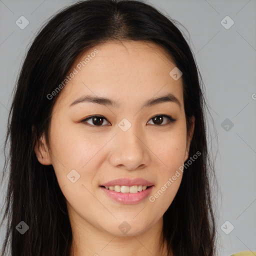 Joyful asian young-adult female with long  brown hair and brown eyes