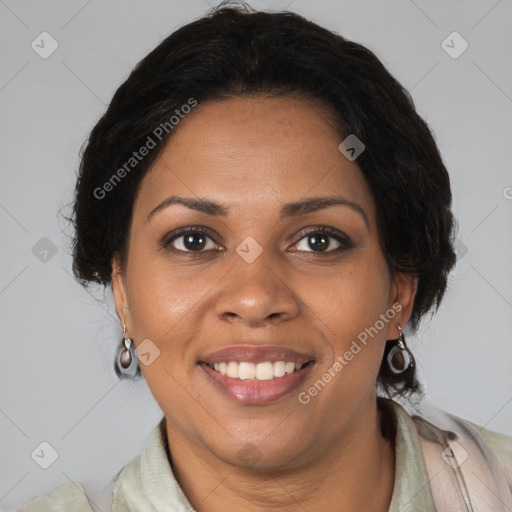 Joyful black adult female with medium  brown hair and brown eyes