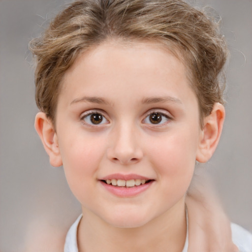 Joyful white child female with short  brown hair and brown eyes