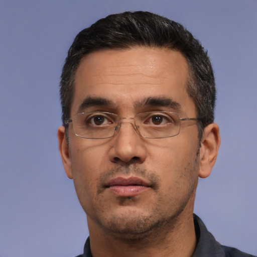 Neutral white adult male with short  black hair and brown eyes