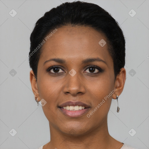 Joyful black young-adult female with short  black hair and brown eyes