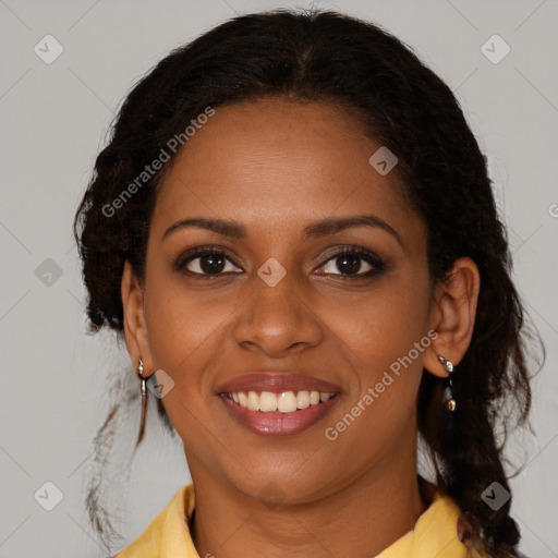 Joyful black young-adult female with medium  brown hair and brown eyes