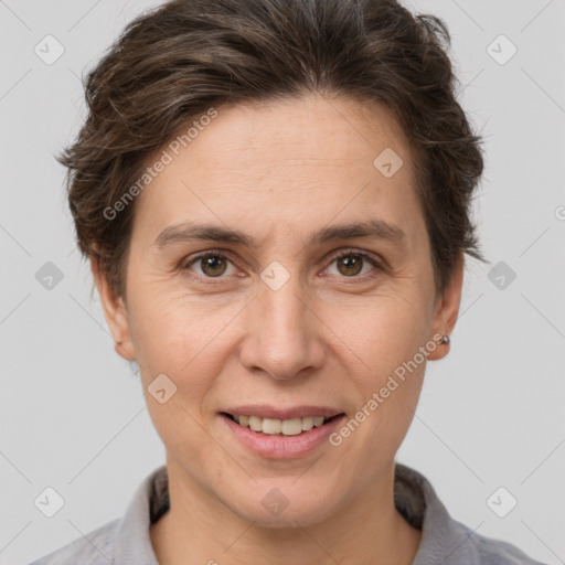 Joyful white adult female with short  brown hair and brown eyes