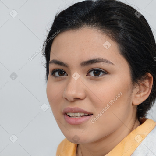 Joyful asian young-adult female with medium  brown hair and brown eyes