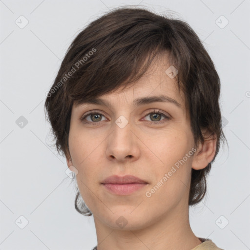 Neutral white young-adult female with short  brown hair and brown eyes