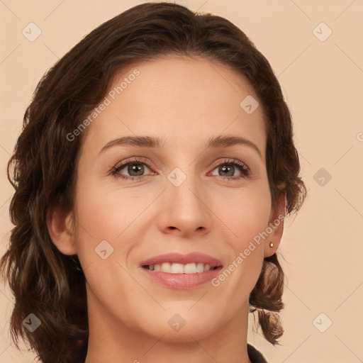 Joyful white young-adult female with medium  brown hair and green eyes