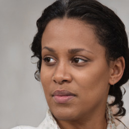 Joyful black young-adult female with medium  brown hair and brown eyes