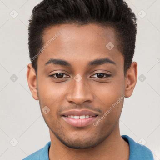 Joyful black young-adult male with short  brown hair and brown eyes