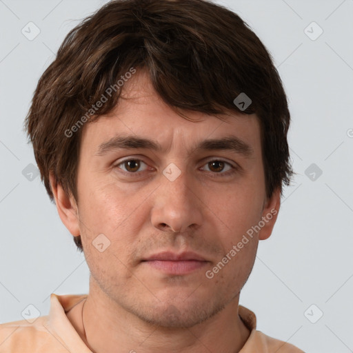 Neutral white young-adult male with short  brown hair and brown eyes