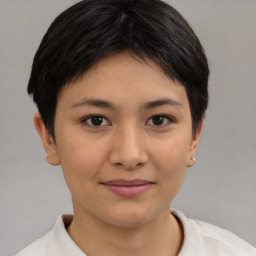 Joyful asian young-adult female with short  brown hair and brown eyes