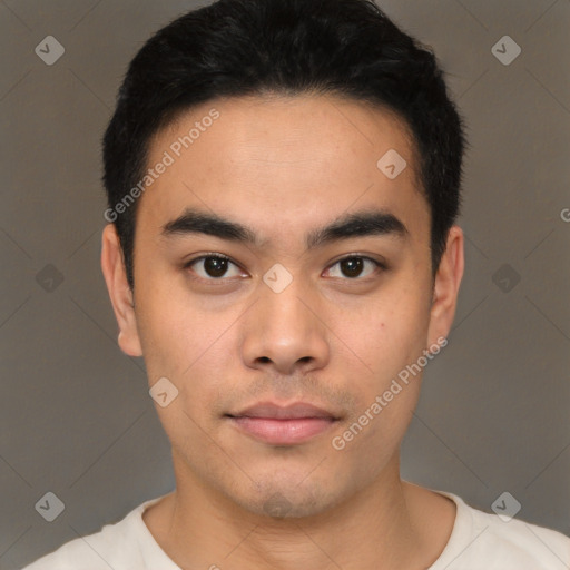 Neutral latino young-adult male with short  black hair and brown eyes