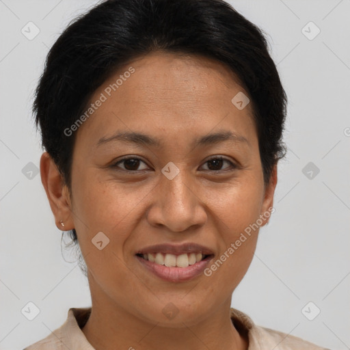 Joyful white adult female with short  brown hair and brown eyes