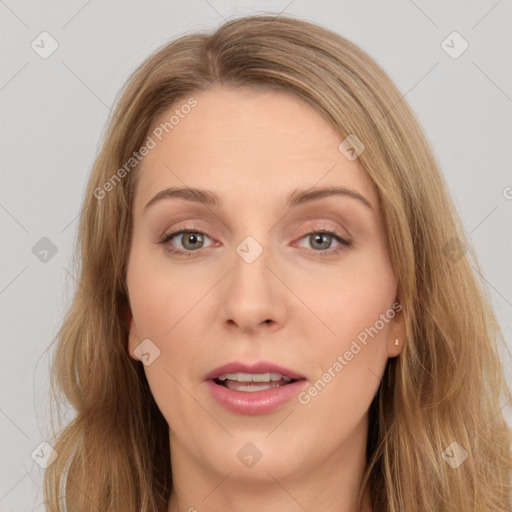 Joyful white young-adult female with long  brown hair and brown eyes