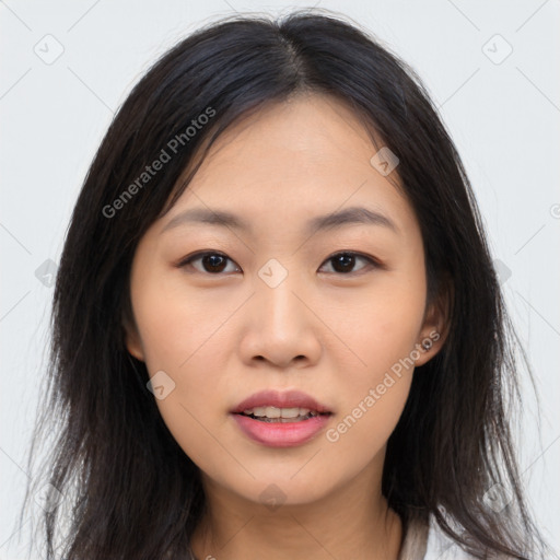 Joyful asian young-adult female with long  brown hair and brown eyes