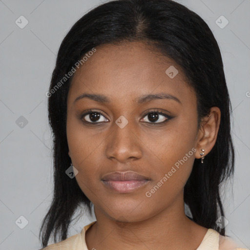 Joyful black young-adult female with medium  black hair and brown eyes