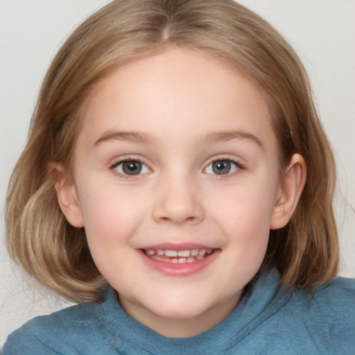 Joyful white child female with medium  brown hair and blue eyes