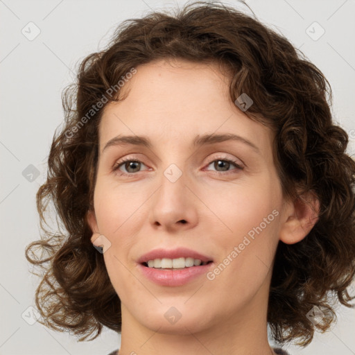 Joyful white young-adult female with medium  brown hair and green eyes