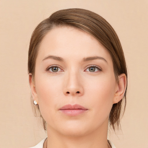 Neutral white young-adult female with medium  brown hair and brown eyes