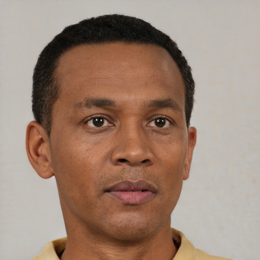 Neutral black young-adult male with short  brown hair and brown eyes