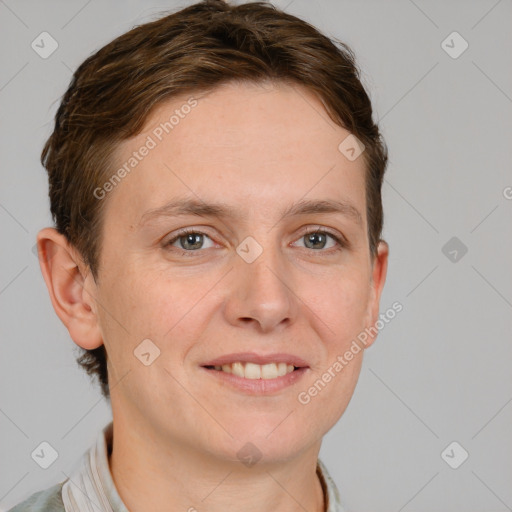 Joyful white young-adult female with short  brown hair and grey eyes