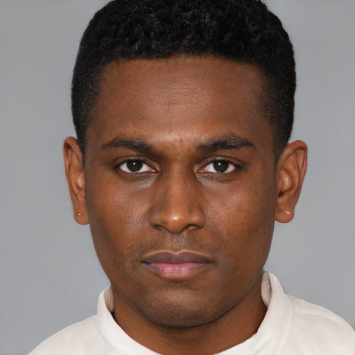 Neutral latino young-adult male with short  brown hair and brown eyes