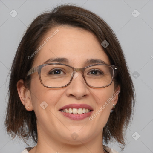 Joyful white adult female with medium  brown hair and brown eyes