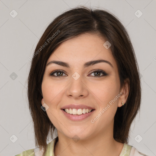 Joyful white young-adult female with medium  brown hair and brown eyes