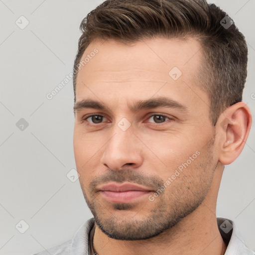 Neutral white young-adult male with short  brown hair and brown eyes