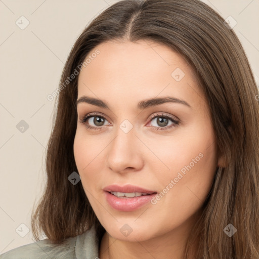 Neutral white young-adult female with long  brown hair and brown eyes