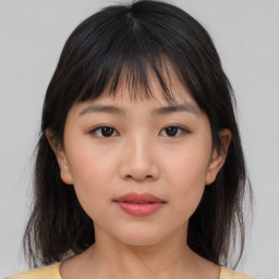 Neutral asian young-adult female with medium  brown hair and brown eyes