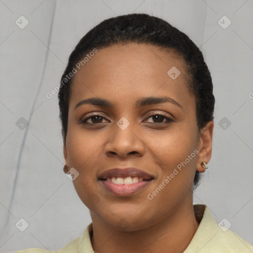 Joyful latino young-adult female with short  black hair and brown eyes