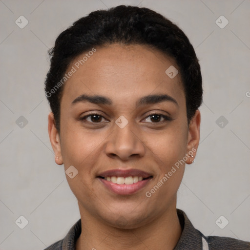 Joyful latino young-adult female with short  black hair and brown eyes