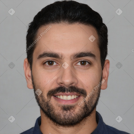 Joyful white young-adult male with short  black hair and brown eyes