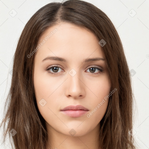 Neutral white young-adult female with long  brown hair and brown eyes