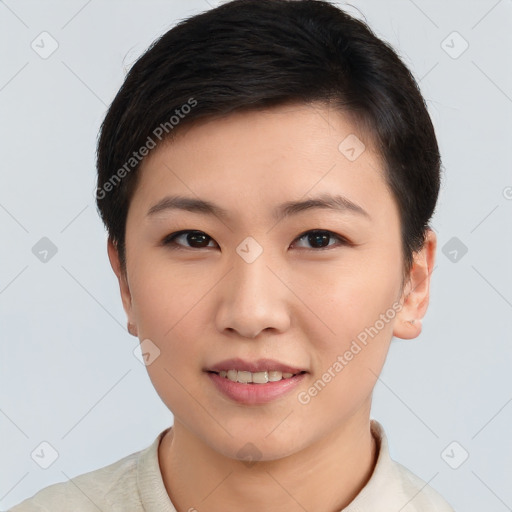 Joyful asian young-adult female with short  brown hair and brown eyes