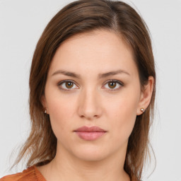 Neutral white young-adult female with medium  brown hair and brown eyes