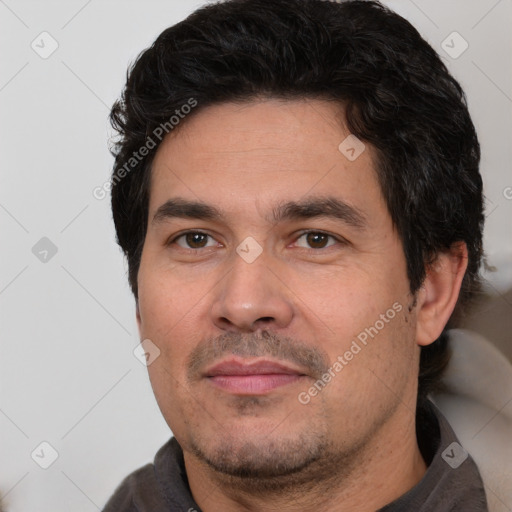 Joyful white adult male with short  black hair and brown eyes